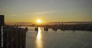 View during sunrise from Royal Wharf towards Thames Barrier and Woolwich. Thames barrier is located on the River Thames in East London.