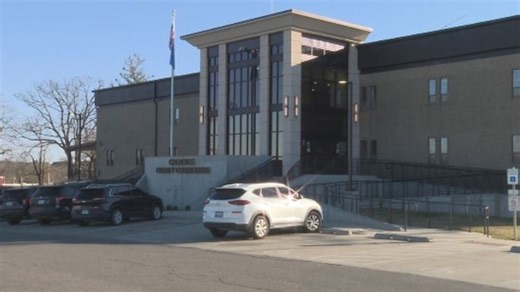 What happened to Cherokee County employees' health benefits?