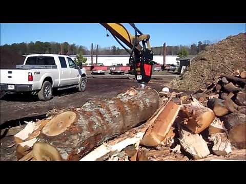 Black Splitter: The Mini Excavator Log Splitter in Action