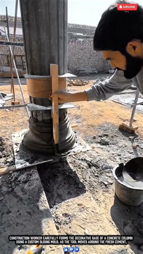 Worker Shapes Decorative Concrete Base of a Column Using a Sliding Mold Tool