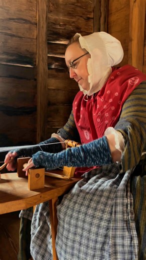 In the 18th Century, this type of loom was used to weave narrow bands of cloth – called “tapes.” Tapes were used for straps, trim, ties, etc… Women in the 18th century used tapes for a multitude of reasons. For example, the thin tapes of fabric were used to close their aprons, tie on their petticoats, and to hold little things at their waist so they could access them easily. Our living history interpreter demonstrates how to operate the Foot Pedal Tape Loom in this video — enjoy! #18thcenturylif