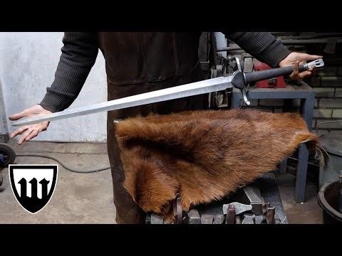 Forging a pattern welded two handed longsword, the complete movie.