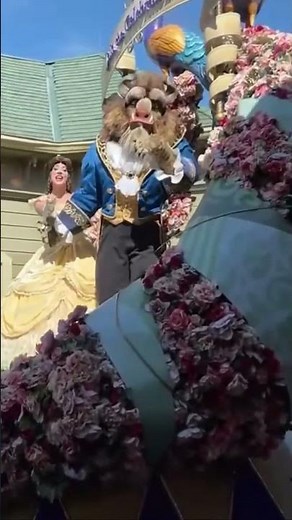 Belle and Beast blowing Kisses in Magic Kingdom
