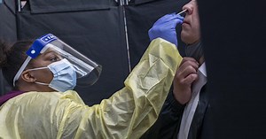 How long should you isolate if you're fully vaccinated but have Covid-19? There is some debate