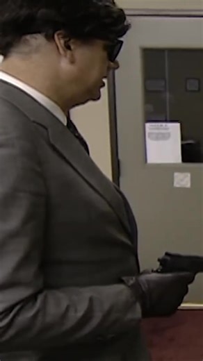 In a tense situation, a robber wearing a wig delivers a chilling warning: 'Do what you're told and no one gets hurt.' The threat hangs heavy in the air. #thefbifiles #truecrime #crimeinvestigation #forensicevidence #unsolvedmystery #robbery #crime #police #investigation #justice | The FBI Files