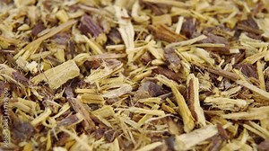 Ayurvedic herb crushed dried Liquorice root. Macro. Rotation. Glycyrrhiza glabra medicinal healing ingredient