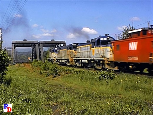 A train at Olyphant, Pennsylvania on the Cabondale Line has oddly painted SD45s on the lead and a nice set of Alco and GE helpers. From the From the John Pechulis Media (JPM) show "Railfanning the Delaware & Hudson, Part 4" https://rfd.video/DandH4 | Railfan Depot