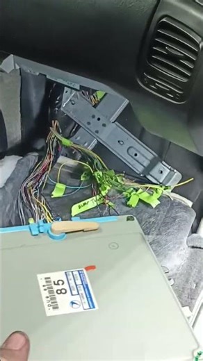 where does the stock ECU go in this Subaru Legacy??
