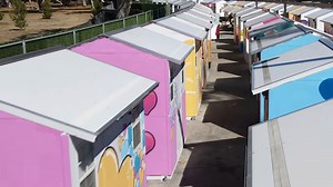 Inside the rent-free tiny home village with laundry and meals provided