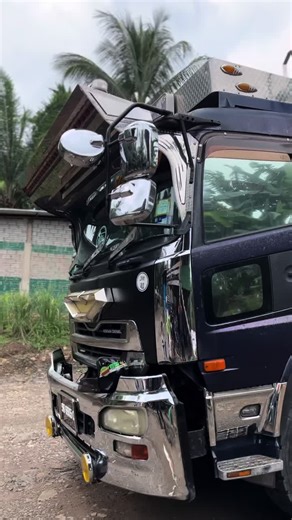 Exploring the Stunning Blue Dump Truck in Paradise