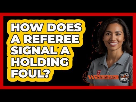 How Does A Referee Signal A Holding Foul?