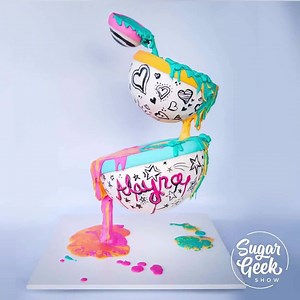 5.5K views · 124 reactions | Learn to make a cake that looks like it's floating in mid air! This tutorial teaches you how to build the structure, incorporate supports and fun effects that complete this gravity-defying floating bowls cake.⁠ ⁠ Get the tutorial here: https://sugargeekshow.com/class/gravity-defying-floating-bowls-cake-tutorial/ | Sugar Geek Show | Facebook