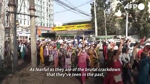 3.1K views · 51 shares | Myanmar coup: a look at the protests sweeping the country. Massive street demonstrations have taken place since Myanmar's military staged a coup on February 1 and detained civilian leader Aung San Suu Kyi, ending a decade-long experiment with democracy. | AFP News Agency | Facebook