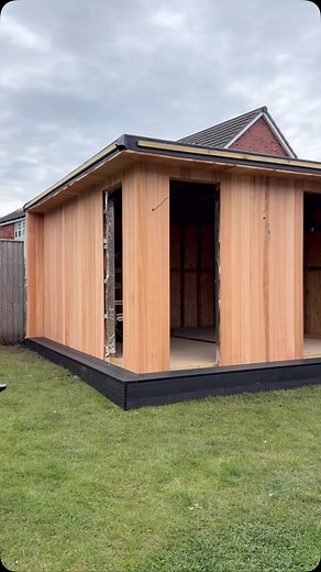 260 reactions · 3 comments | Cedar going up and composite decking going down!  We’re making solid progress on our latest garden room, rich cedar cladding paired with sleek charcoal composite decking for a modern, low-maintenance finish.  Stay tuned for the full transformation! #GardenRoom #CedarCladding #CompositeDecking #OutdoorLiving #CharcoalDecking #ModernGardenDesign #Timberwork #DeckingInspo #BuildInProgress #GardenGoals | Lytham Exterior Spaces | Facebook