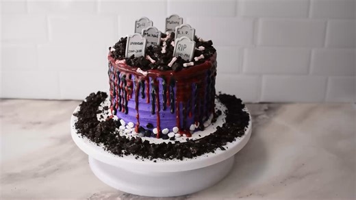 72K views · 332 reactions | For a frighteningly fun time in the kitchen this Halloween, gather your family around the cauldron to create a sweet, spooky dessert. Get creative with this spooktacular Halloween themed cake. ⚰️  https://www.culinary.net/videos/item/1195-ghostly-graveyard-cake | Culinary.net | Facebook