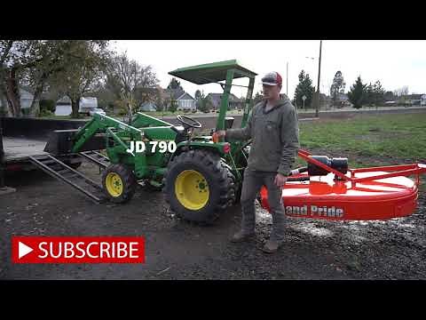 Hauling a Tractor and Mower in a Big Tex 14LP Dump Trailer