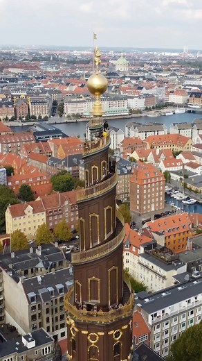 VisitCopenhagen on Instagram: "Our Saviour’s is one of Denmark's most famous churches 📍On the top, Our Saviour Himself stands on a golden globe and keeps watch over the city 🌍 📸 @drone__tacular #churches #archidaily #architecture #featuremevisitcopenhagen #visitcopenhagen #igerscopenhagen #copenhagen #sharingcph #cphpicks #delditkbh #ibyen #beautifuldestinations #denmark #photography #travel #wanderlust #travelgram"
