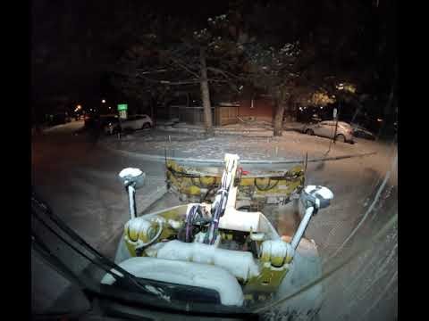 Cat 908 snowplowing.