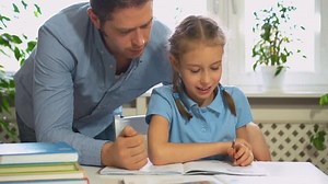 Father Helping Daughter Homework Home Stock Footage Video (100% Royalty-free) 33555823 | Shutterstock