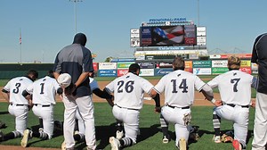 Des Moines Roosevelt baseball team kneels during national anthem ahead of first game of the 2020 season