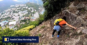 Viral video shows hikers in Hong Kong scaling slope along Ocean Park’s insignia