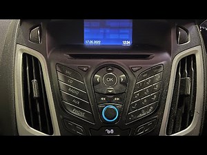 How to adjust the date and time in the Ford Focus?