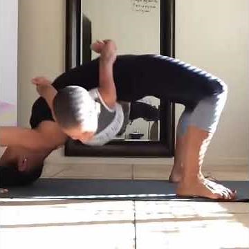 Mom and Son Bond During Yoga Pose