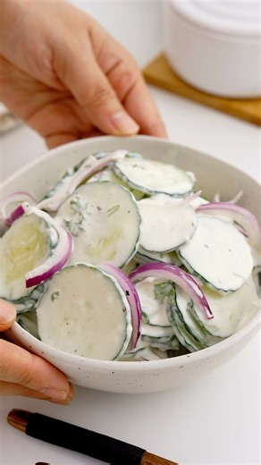 The only cucumber side dish you need for your next party and gathering 🎉🥳🥒 Easy quick creamy cucumber salad recipe. Ingredients Cucumber 1-2 medium size Salad onion 1 Greek yoghurt 6 tbsp Mayonnaise 6 tbsp Dijon mustard 1 tsp Lemon juice 1 tbsp Grated garlic 1 tsp Salt & pepper to taste Parsley #cucumber #saladrecipe #partyfood #salad | Khin's Kitchen