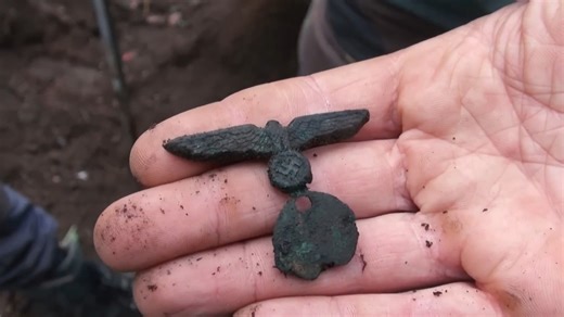 What remains hidden beneath a forest once used by the Third Reich?