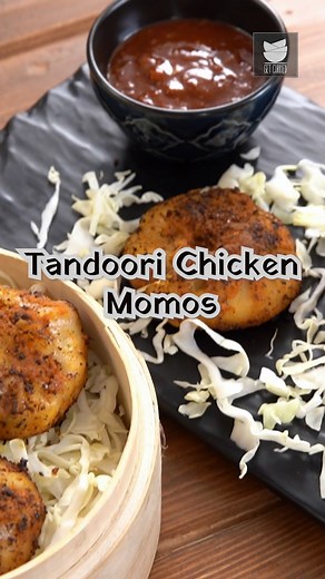 Tandoori Chicken Momos is a Tandoori twist to a basic steamed momos. It taste's extremely delicious and the smokey flavour, makes it more aromatic. Ingredients For Dough: (Serves 3) - 1/2 cup Water - 1 1/2 cup Refined Flour - Salt - 1 tsp Oil - Water Ingredients For Filling: - 1/2 cup Leftover Chicken Tandoori(boneless) - 1 tbsp Coriander Leaves - 1 tsp Green Chilli(chopped) - 1/2 Onion(chopped) - Salt - 1 tsp Lemon Juice Ingredients For Tandoori Masala: - 1/2 cup Yogurt - 1 tsp Red Chilli Powde