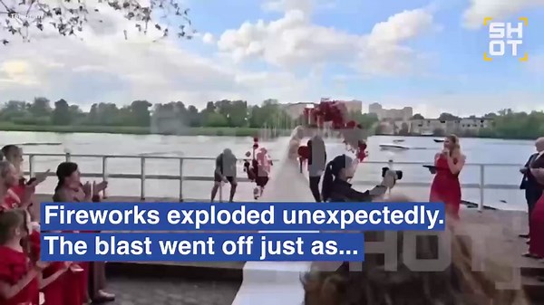 Shocking moment wedding descends into chaos as fireworks hit newlyweds