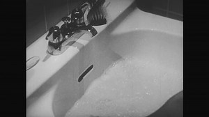 clip-25967486-united-states-1950s-boy-looks-clean-nails