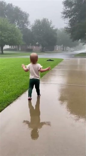 Toddler Discovers Pure Joy Playing Barefoot in the Rain ☔💛