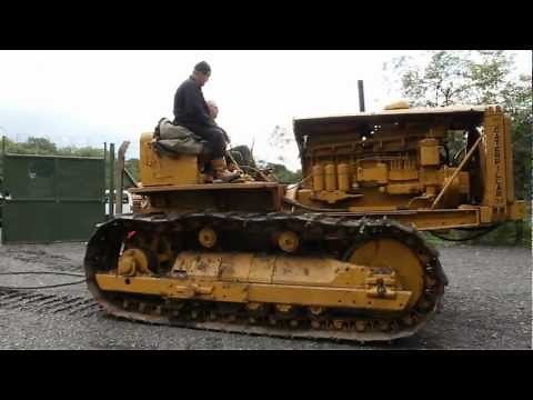 Caterpillar D8 Bulldozer Pulling huge Tree