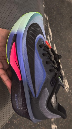 Nike Zoom Fly 6 Glam Road Running Shoes in Dark Obsidian/Racer Blue/Emerald Rise/ Black colorway.