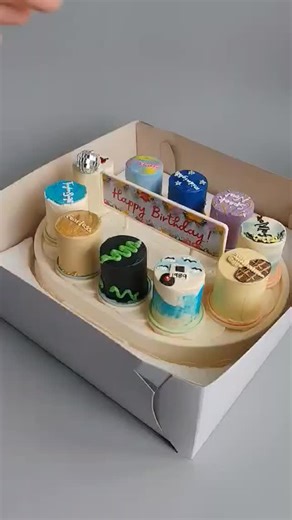 A box of customized mini cake carousel #keikeuoven #bentocake #monthsary #anniversary #manilafoodie #cookiesph #chocolatelover #yummyph #manilacakes #cakesphilippines #cakesph #chewycookies #customcakesph #cookiesphilippines #manilacookies #dessertphilippines #foodieph #cupcakesphilippines#bouquetcake #cupcakes #diyfood #diycakes #desserts #foodies #philippinedesserts #customizedesserts #yummyfood | KeiKeu Oven | Facebook