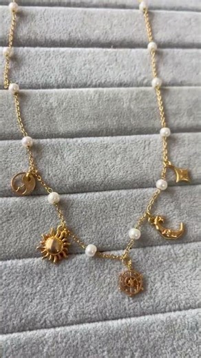 pearl necklace with small charms