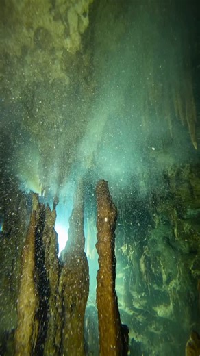Percolation falls from the ceiling dislodged by the divers bubbles. One of the advantages of rebreathers for cave diving! #cavedivingadventures #cavediving #cenotes #sidemount #tulum #cavedivingmexico #rebreatherdiving #ccrdiving #sdidivers | Cave Diving Adventures by Skanda Coffield-Feith