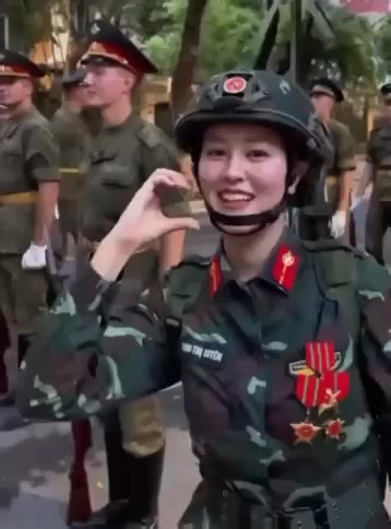 226K views · 13K reactions | A Vietnamese female soldier flirts with a Russian soldier who traveled to Vietnam to take part in the military parade. 欄 #Vietnam #Russia | Russia Unofficial | Facebook