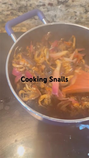 Cooking Snails . Rich in Vitamin A.