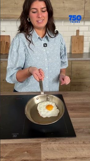 Cook a fried egg in a stainless steel pan