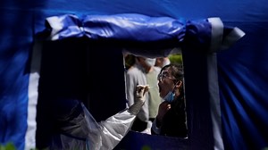 Beijing Enforces Lockdowns, Expands COVID-19 Mass Testing