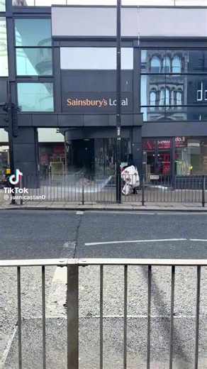 A man just casually spraying people with a fire extinguisher 'Diversity is our strength'