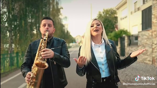 Live Outdoor Saxophone Performance with Stunning Backdrop