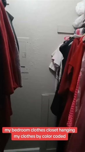 my bedroom clothes closet hanging my clothes by color coded