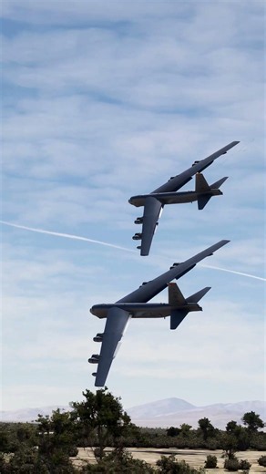B-52 Stratofortresses conduct a low-altitude flyby near Edwards Air Force Base.