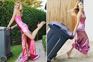 Amanda Holden flashes her legs as she glams up to take the bins out