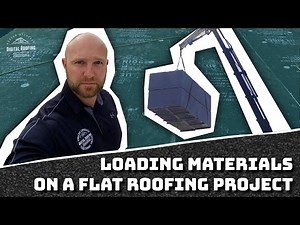 Commercial Roofing - Loading Supplies On A Flat Roof