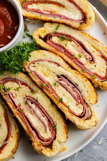 11K views · 71 reactions | Make this Italian Meat Stromboli from scratch with easy homemade dough, loaded with Italian cold cuts, and options for using garlic butter or pizza sauce. https://thestayathomechef.com/stromboli/ | Recipes | Facebook