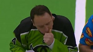 Joey Chestnut demolishes competition during surprise donut-eating contest